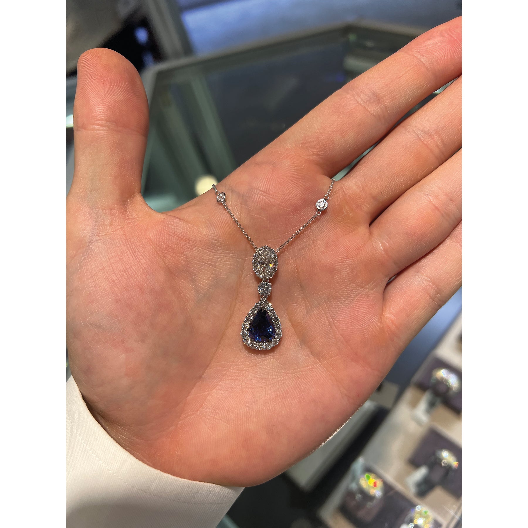 18K 5.78 Ct CDC Certified Pear Shape Blue Sapphire and Oval Diamond Pendant
