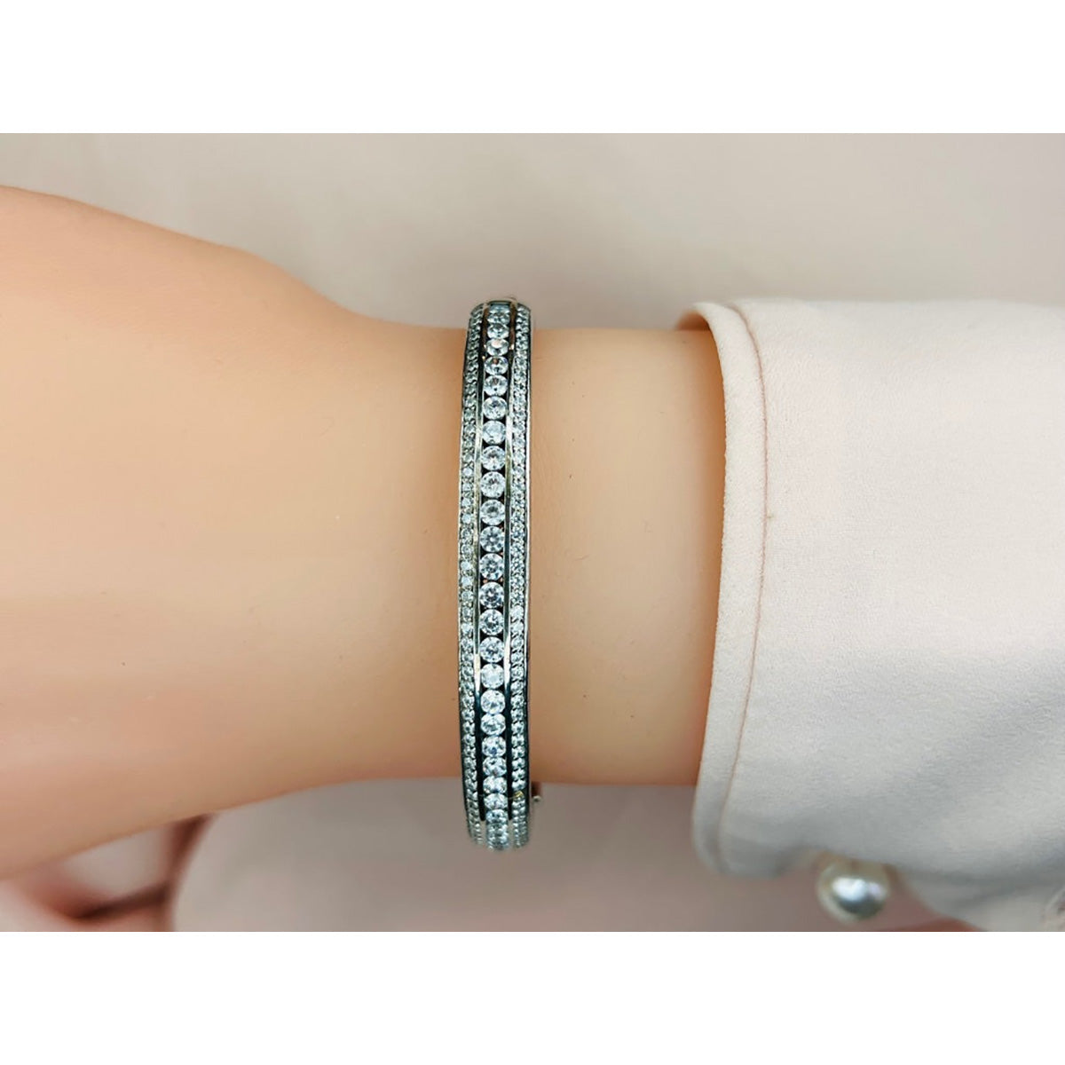 Three Row Channel And Prong Set Bangle